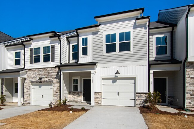 Foto del edificio - Luxurious 3-Bedroom Townhome Living in the...