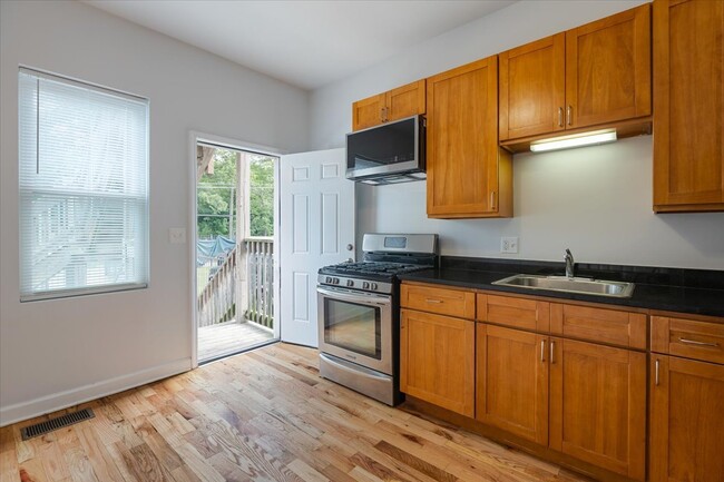 Building Photo - 1234 W 49th Pl