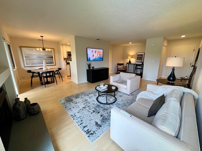Living, dining and workspace areas - 820 Sea Spray Ln