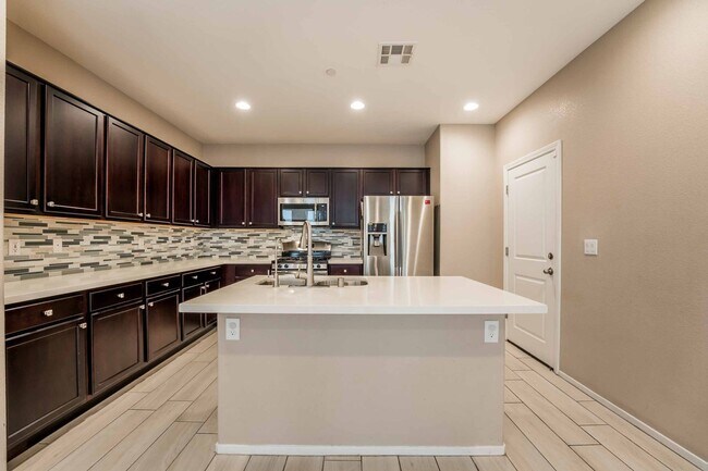 Building Photo - Modern Cadence Retreat with Designer Finishes & Spacious Loft!