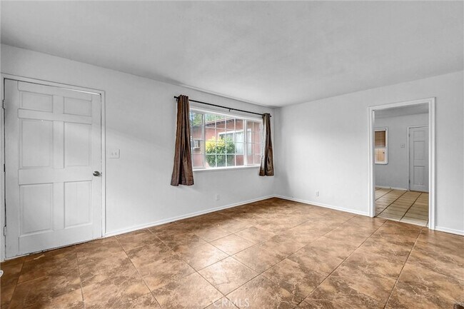 Building Photo - 9436 Ramona Ave