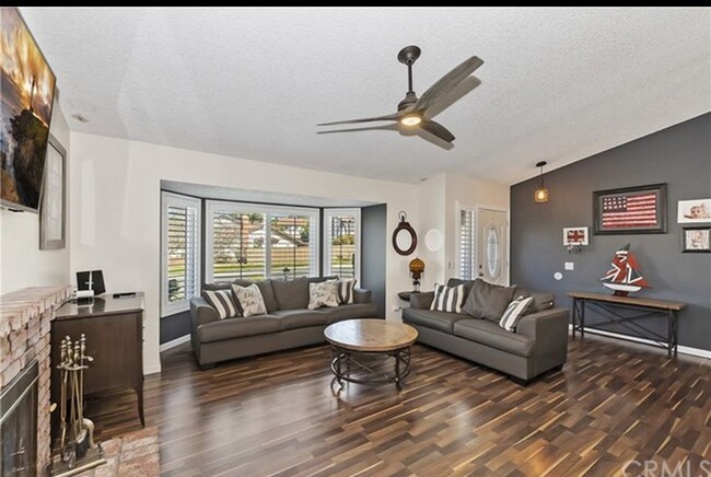 Living room with fireplace - 24137 Pleasant Run Rd