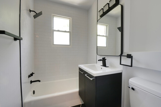 Renovated bathroom; contemporary design - 1209 47th Pl NE