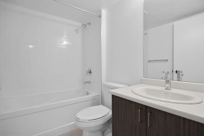 Building Photo - One Plus Den Furnished unit