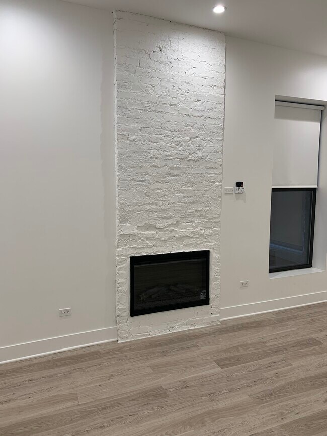 Family Room with FP and Window - Large - 18 W Ontario St