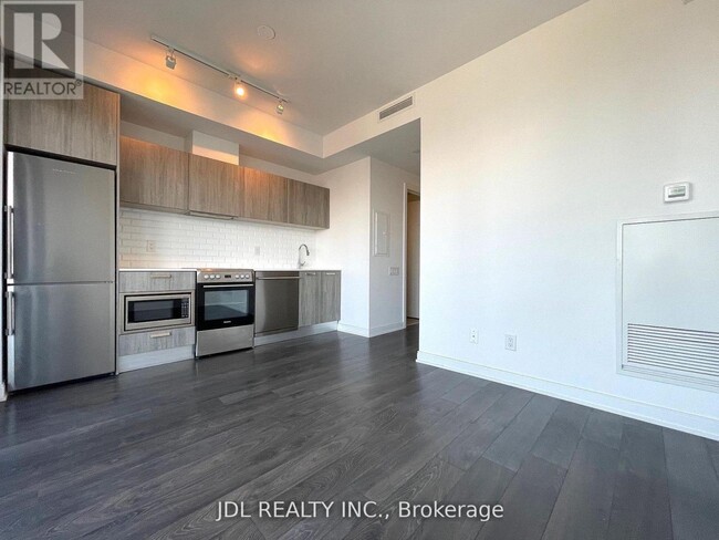 Photo du bâtiment - 50 Charles St E