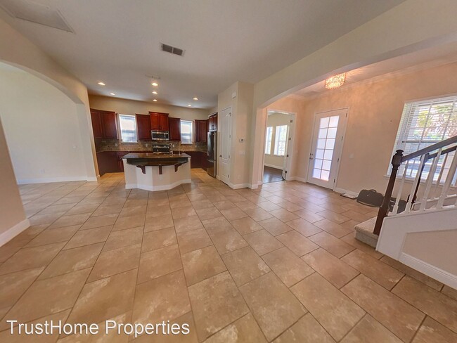 Building Photo - 4 br, 3.5 bath House - 8453 Laureate Blvd