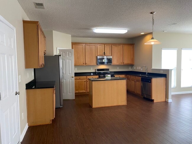 Building Photo - 8323 Carolina Laurel Ct