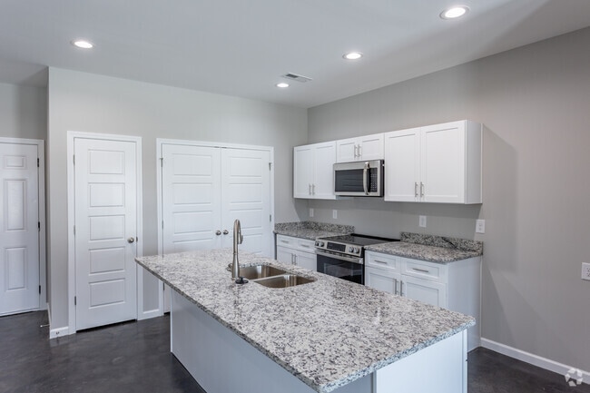 3BR, 2.5BA - 1100SF - Kitchen - Caney Commons