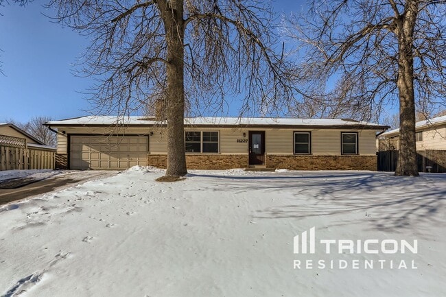 Building Photo - 11227 Sumter Ave N