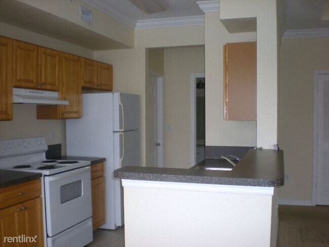 Building Photo - 1 br, 1 bath Condo - 15015 Michelangelo Blvd