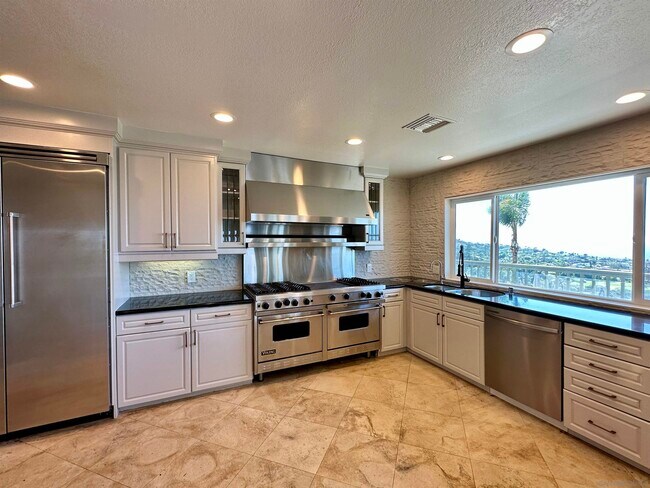 Foto del edificio - 6920 Country Club Dr