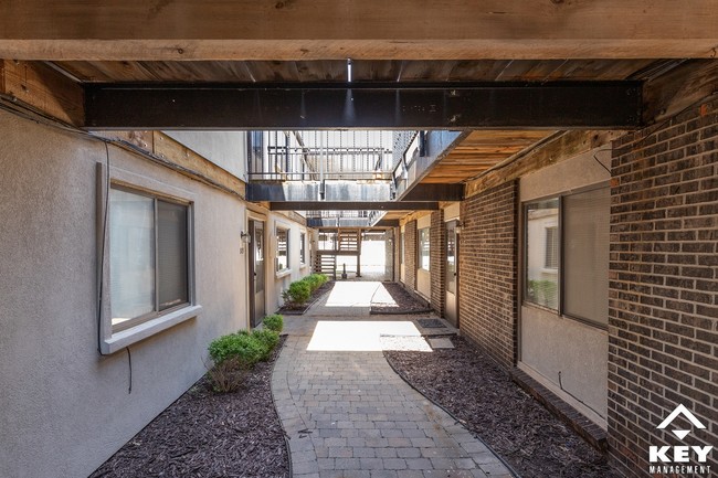 Apartment Breezeway - Pheasant Run Apartments