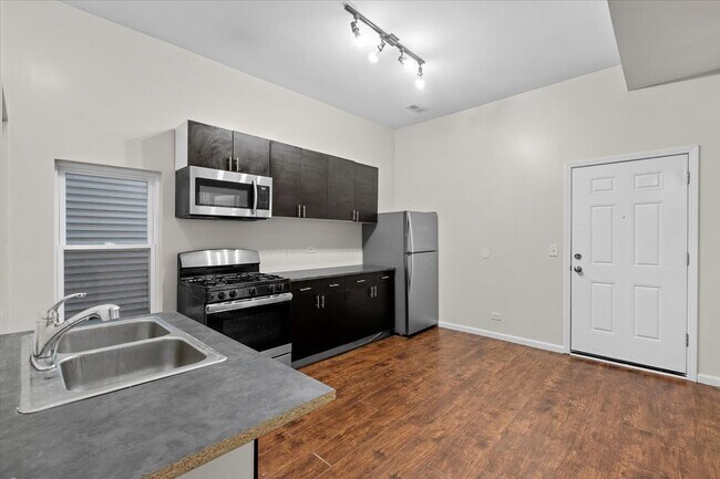 Foto del edificio - 4608 S Evans Ave