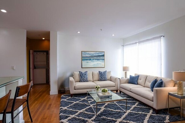 Spacious living room. Please note this is a digitally staged photo - 371 30th St