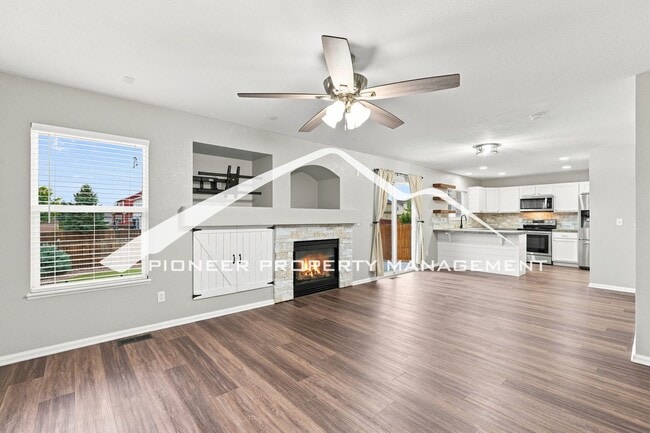 Building Photo - Spacious 4-Bedroom Home with a Finished Basement, 2 car garage, EV Charger and Low Maintenance, E...