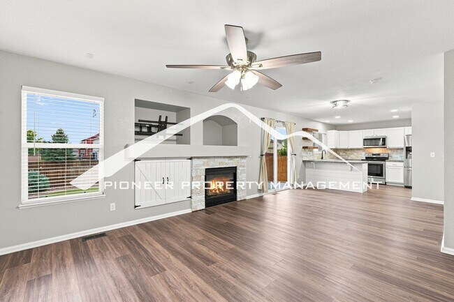 Foto del edificio - Spacious 4-Bedroom Home with a Finished Basement, 2 car garage, EV Charger and Low Maintenance, E...