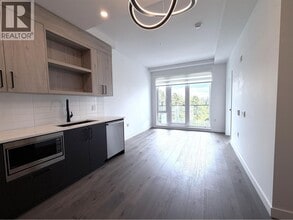 Building Photo - 6859 Cambie St.