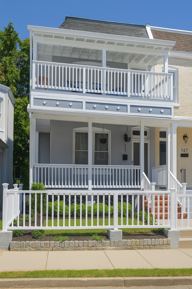 Building Photo - Charming Row Home with Modern Comforts in ...