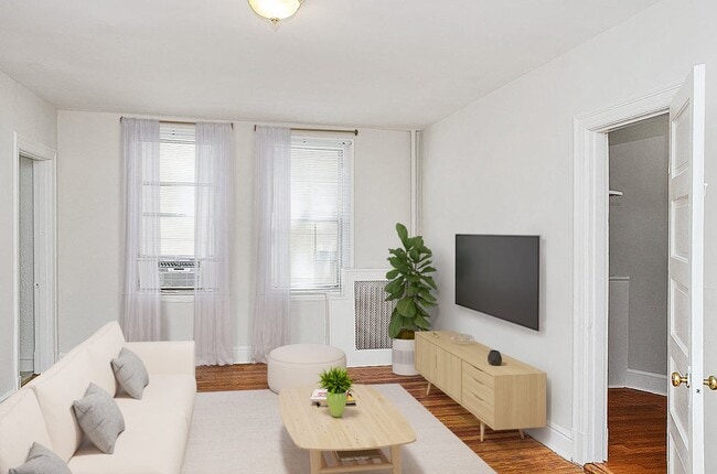 Living area (virtually staged) - President Madison Apartments