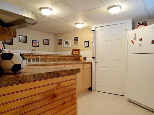 Full sink. 2nd Refrigerator in basement bar included. - 5751 Potomac St