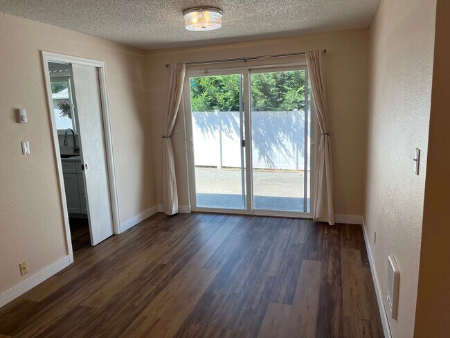Slider door to small private fenced yard - 3803 56th Street Ct E