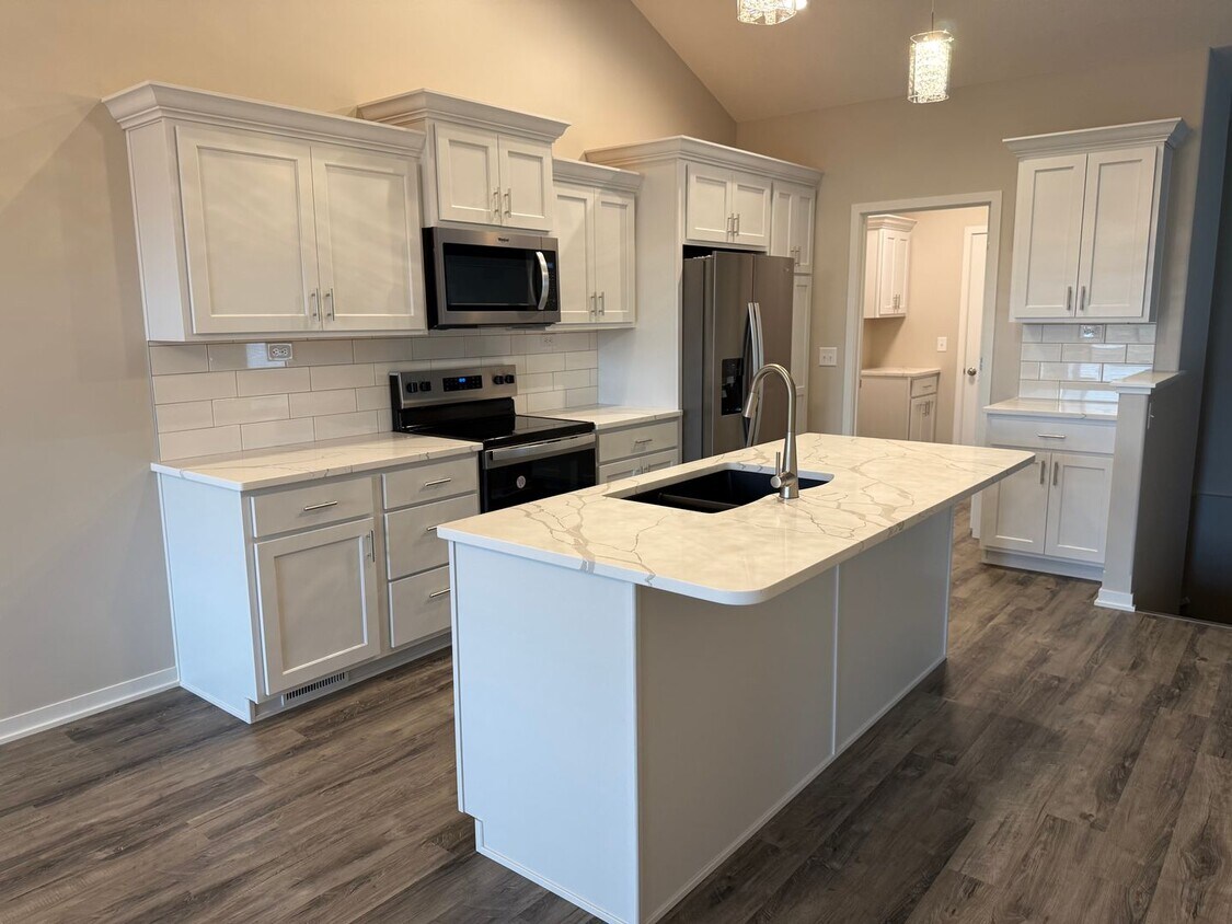 Primary Photo - Walkout ranch townhome with 2 stall garage...