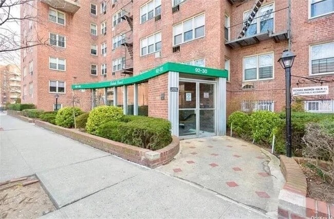 Building Photo - 92-30-56 Avenue -6M