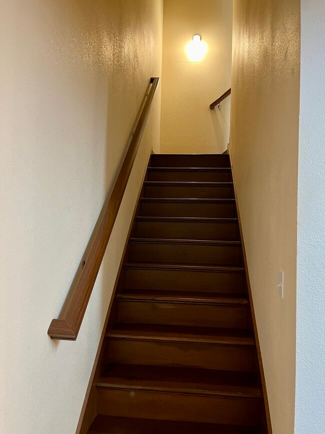 Stairs to loft bedroom - 143 S Main St