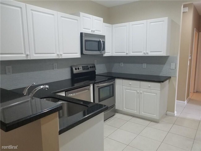 Building Photo - 3 br, 2.5 bath House - 12687 NW 56th Dr