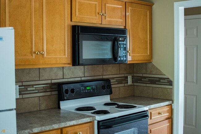 Building Photo - 8037 Creekland Dr