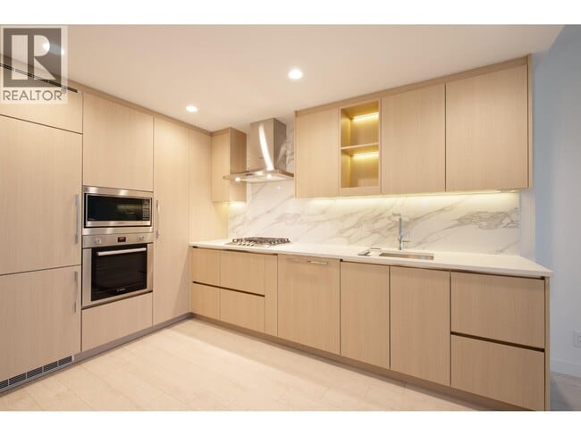 Building Photo - 4880 Lougheed Hwy.