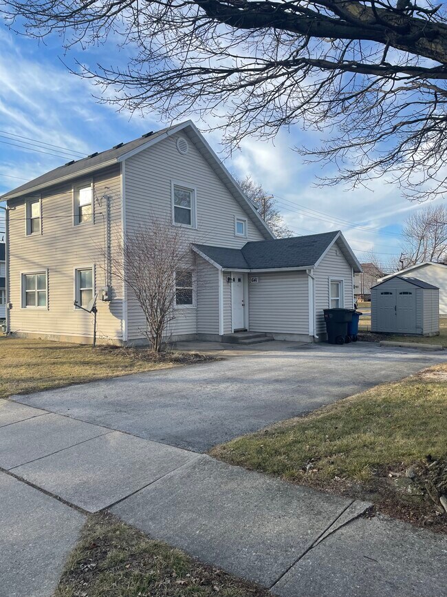East side entry & parking + shed - 641 S College Dr