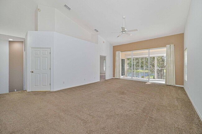 Building Photo - Now Available - 2nd Story Condo with Lake ...