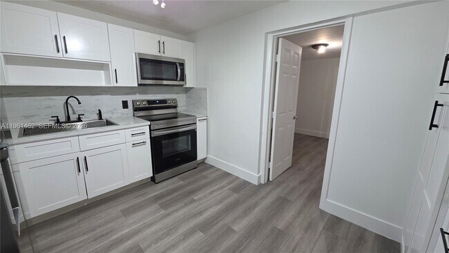 Building Photo - 6616 Raleigh St