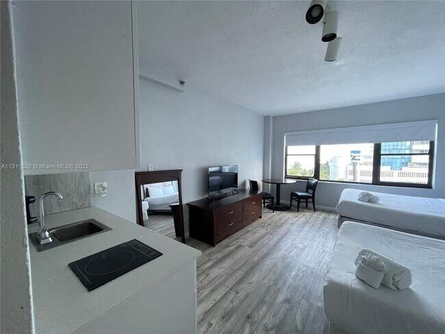 Building Photo - 6345 Collins Ave