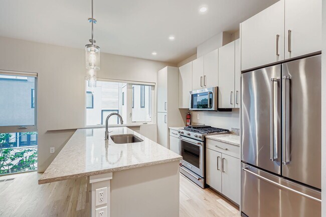 Building Photo - NOT Your Typical 1BR – New, Private Garage...