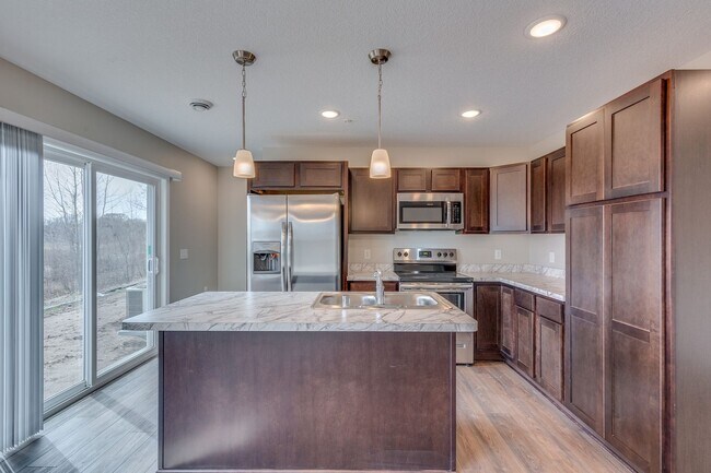 Building Photo - Townhome for RENT 3bd 3ba 2car garage July 01