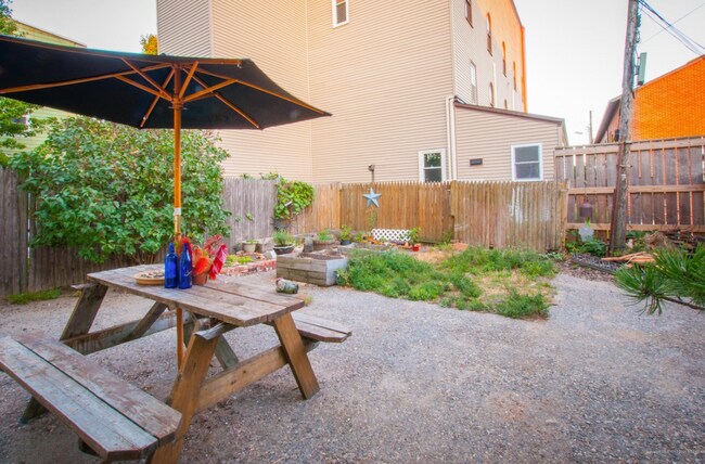 Lovely back yard space, space for a raised bed, and BBQ's - 156 Cumberland Ave