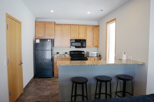 Sala comunitaria - Cocina - Stone Creek Apartments