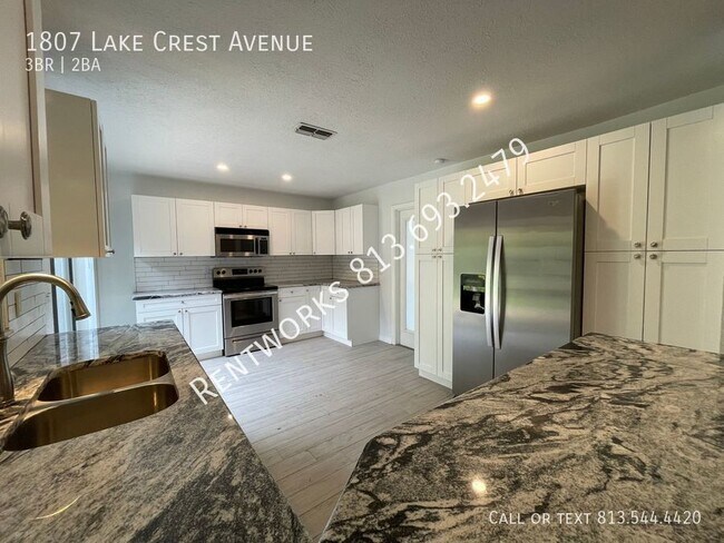 Building Photo - Great Move in Special! Available now! New ...