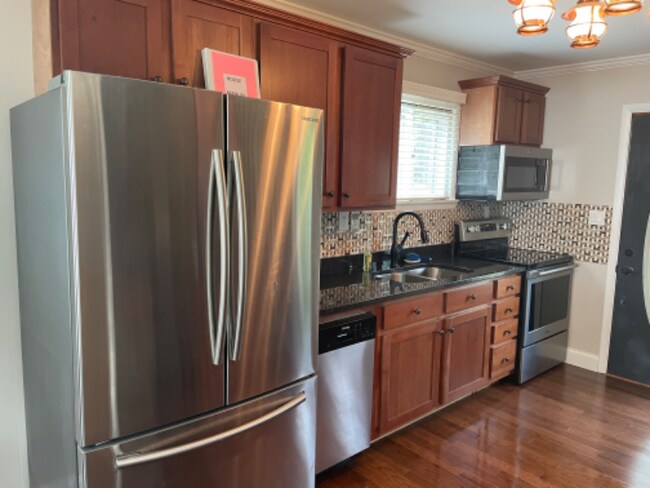 Building Photo - 5765 S Linwood Dr NE
