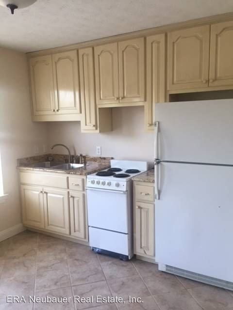 Building Photo - 3 br, 3 bath House - 524 Larissa Lane Apt. A