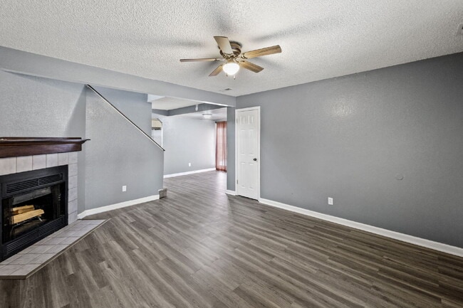Photo - Charming Two-Story Home with Fenced Yard & Cozy Fireplace — Pet-Friendly!