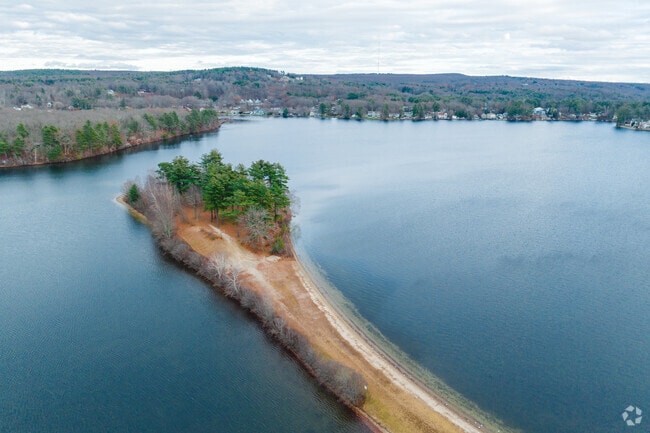 Memorial Beach in Webster invites peaceful walks along the sand.
