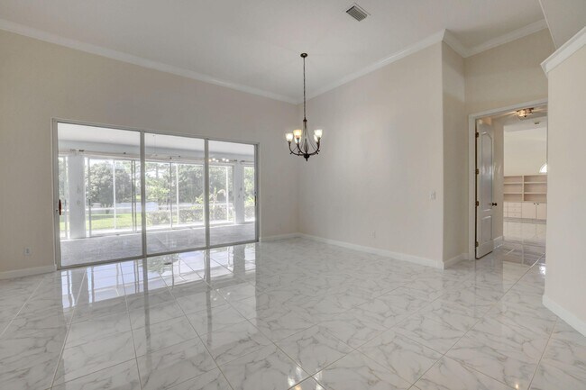 Foto del edificio - 8028 Plantation Lakes Dr