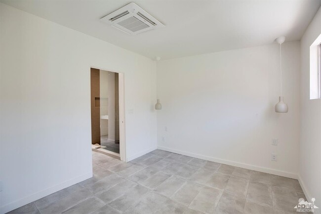Building Photo - 73401 Royal Palm Dr