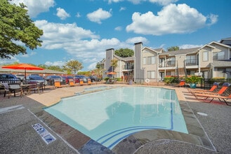 Building Photo - Woodside At Lake Highlands Apartment Homes