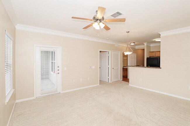 Área de sala de estar/comedor - Villas at Cypresswood