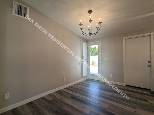 Building Photo - Renovated 3-Bedroom Home with Huge Backyar...